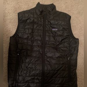 Great Condition Patagonia Nano Puffer Vest. Has a business logo in the back.